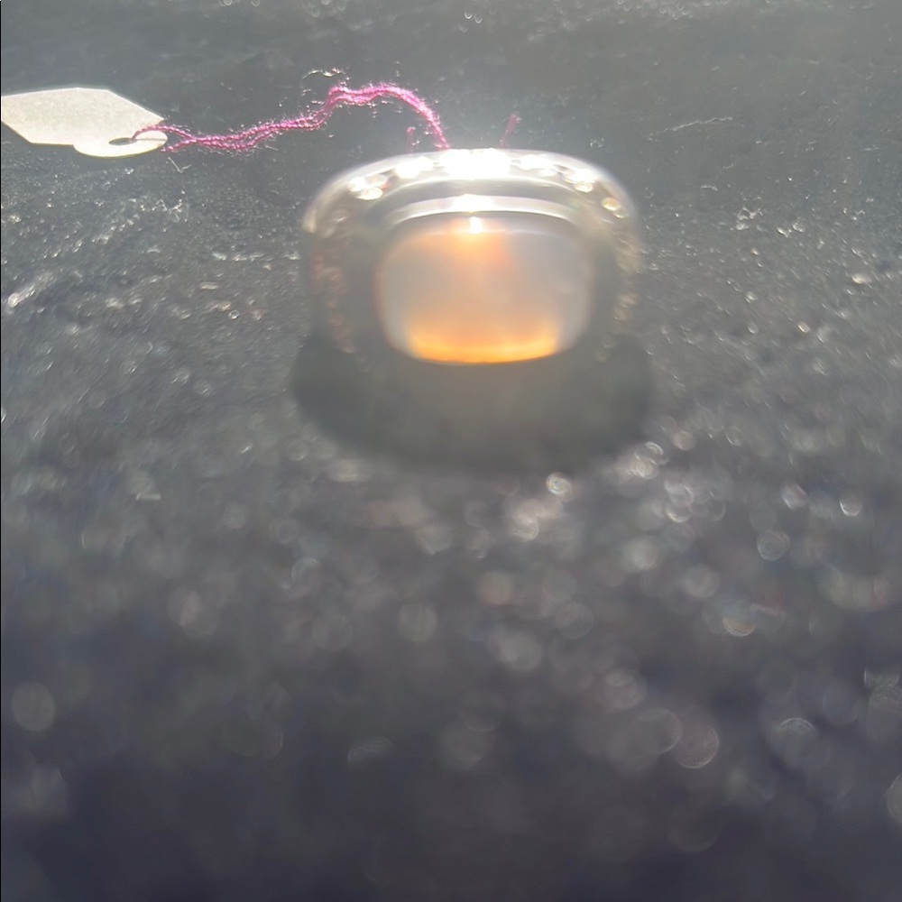 Elegant Silver Ring with Iridescent Stone